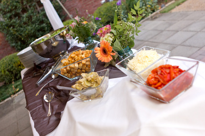 Various salad toppings for a salad bar at a catered event